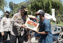 Masa PPKM Darurat, Polresta Sidoarjo Bagikan Sembako Warga Terdampak Covid-19