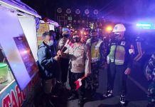 Kibarkan Bendera Merah Putih Sebagai Simbol Optimisme Lawan Covid-19
