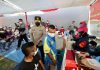 Polda Jatim Melaksanakan Vaksinasi komunitas masyarakat Papua di Surabaya
