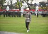 AKP Sandy Putra Menjadi Komandan Upacara Penurunan Bendera Merah Putih