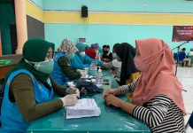 Milenial Mitra Polisi Bersama TNI/Polri dan Pemerintah Kabupaten Malang, Melaksanakan Vaksinasi di SMKN 1 Singosari