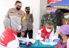 Kapolres Pasuruan menghadiri Vaksinasi massal bersama PWI Pasuruan di Kecamatan Puspo