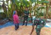 Satgas TMMD Ke 113 Membantu Jemur Hasil Panen Warga