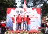 Ditjen Polpum Kemendagri dan Pemkot Depok Bagikan Ribuan Bendera Merah Putih Kepada Warga Negara
